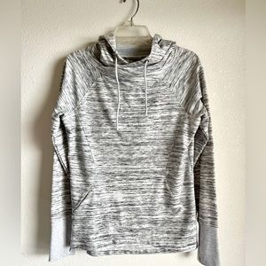 Brand new, never worn, pull over sweater with thumb holes. M
